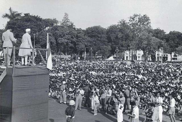 A black and white photograph of Jawaharlal Nehru, India's first Prime Minister.